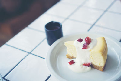 High angle view of cake in plate on table