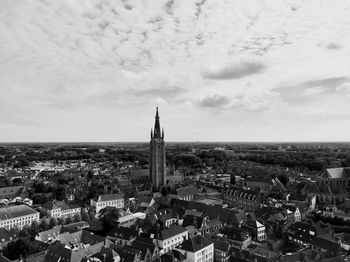 High angle view of city against cloudy sky