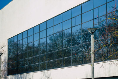 Low angle view of modern glass building