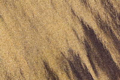 High angle view of shadow on sand