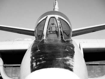 Low angle view of airplane against clear sky