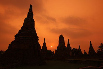 Historic temple in ayutthaya kingdom against sky during sunset