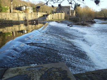 View of canal along buildings