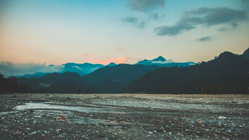 Scenic view of sea against sky during sunset