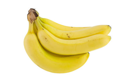 Close-up of bananas against white background