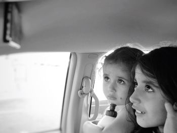 Siblings in car