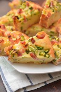 Close-up of pizza served on table