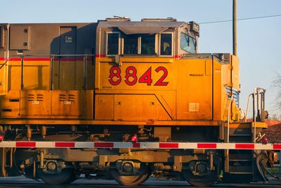 Train on railroad tracks against sky