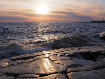 Scenic view of sea against sky during sunset