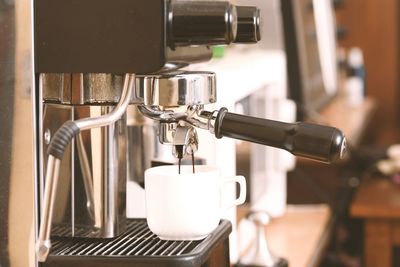 Close-up of coffee cup in cafe