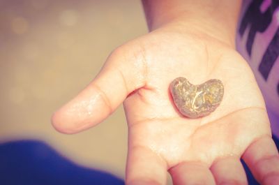 Close-up of woman holding hands