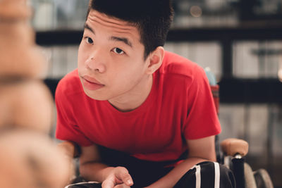 Close-up of boy looking away