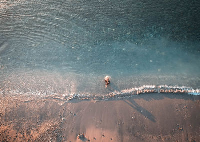 Aerial view of woman at beach