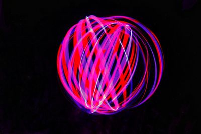 Light painting against black background