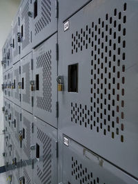 Full frame shot of padlocks on metal grate
