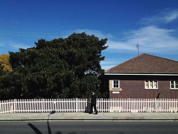 Buildings against blue sky and clouds