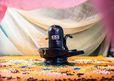 Close-up of sculpture on table