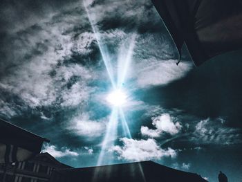 Low angle view of building against sky during sunny day