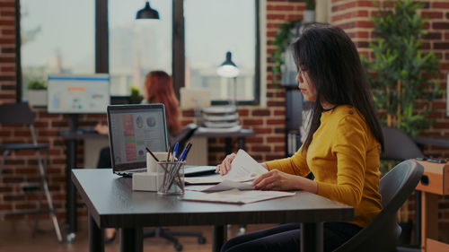 Businesswoman working at office