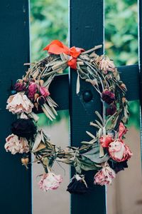 Close up of floral wreath hanging on port