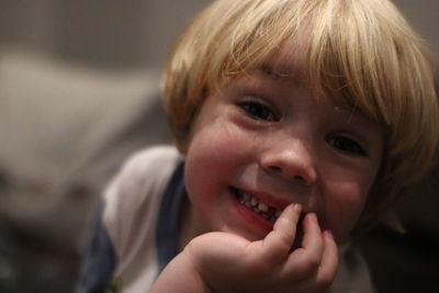 Close-up portrait of smiling boy