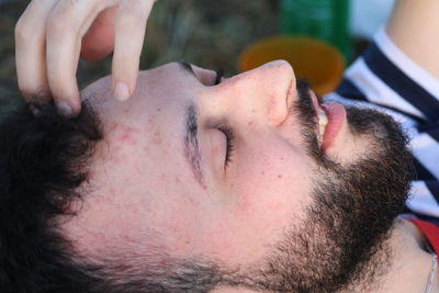 Close-up of young man sleeping