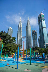 Modern skyscrapers against blue sky