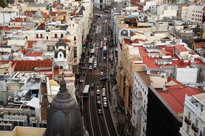 High angle view of street amidst buildings in city