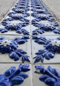 High angle view of metal grate on floor