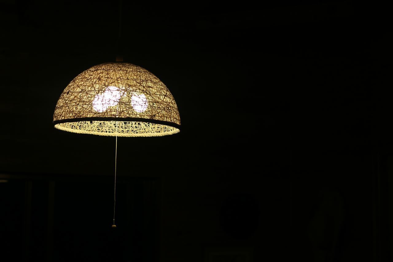 LOW ANGLE VIEW OF ILLUMINATED PENDANT LIGHT