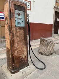 Old rusty pipe on wall