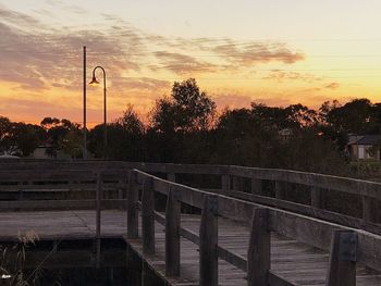 View of railing against sky during sunset