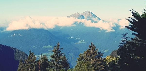 Scenic view of snowcapped mountains against sky