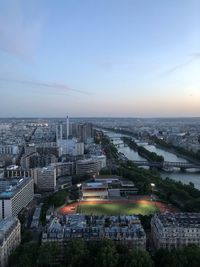 High angle view of illuminated buildings in city against sky