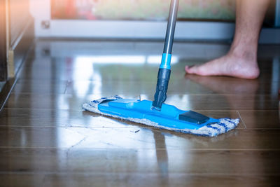 Low section of man cleaning equipment