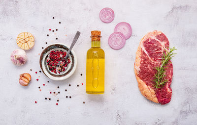 Directly above shot of fruits served on table against white background