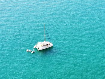 High angle view of sailboat sailing in sea