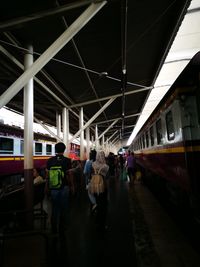 People at railroad station platform