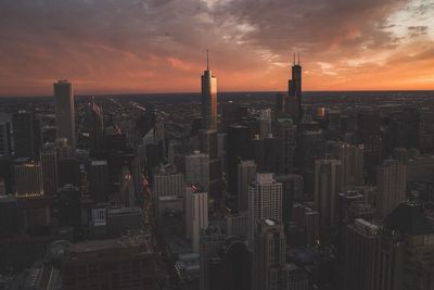 Aerial view of a city at sunset