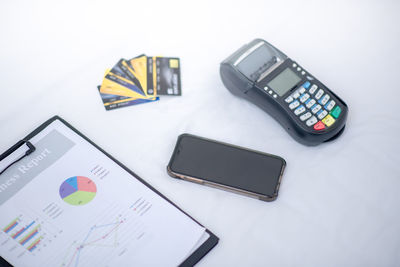 High angle view of smart phone on table