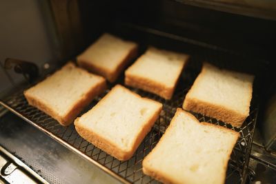 High angle view of bread on cutting board