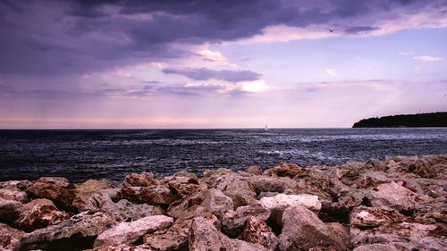 Scenic view of sea against sky during sunset