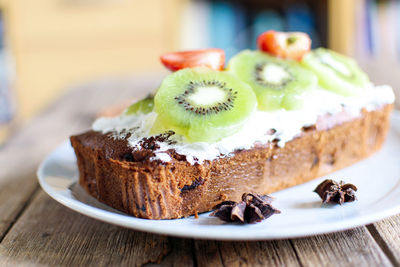 Close-up of cake served on table