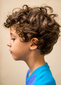 Close-up portrait of boy looking away