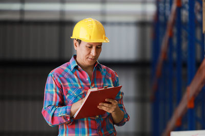 Man working with umbrella