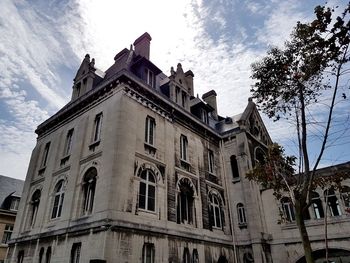 Low angle view of historic building against sky