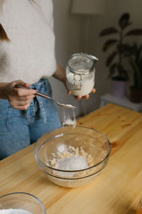 Young woman making christmas cookies