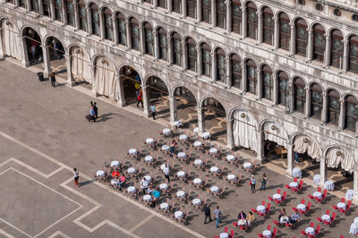 Group of people in front of historical building