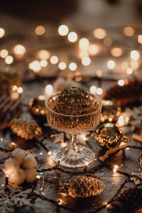 Close-up of illuminated christmas lights on table