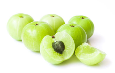 Close-up of fruits against white background